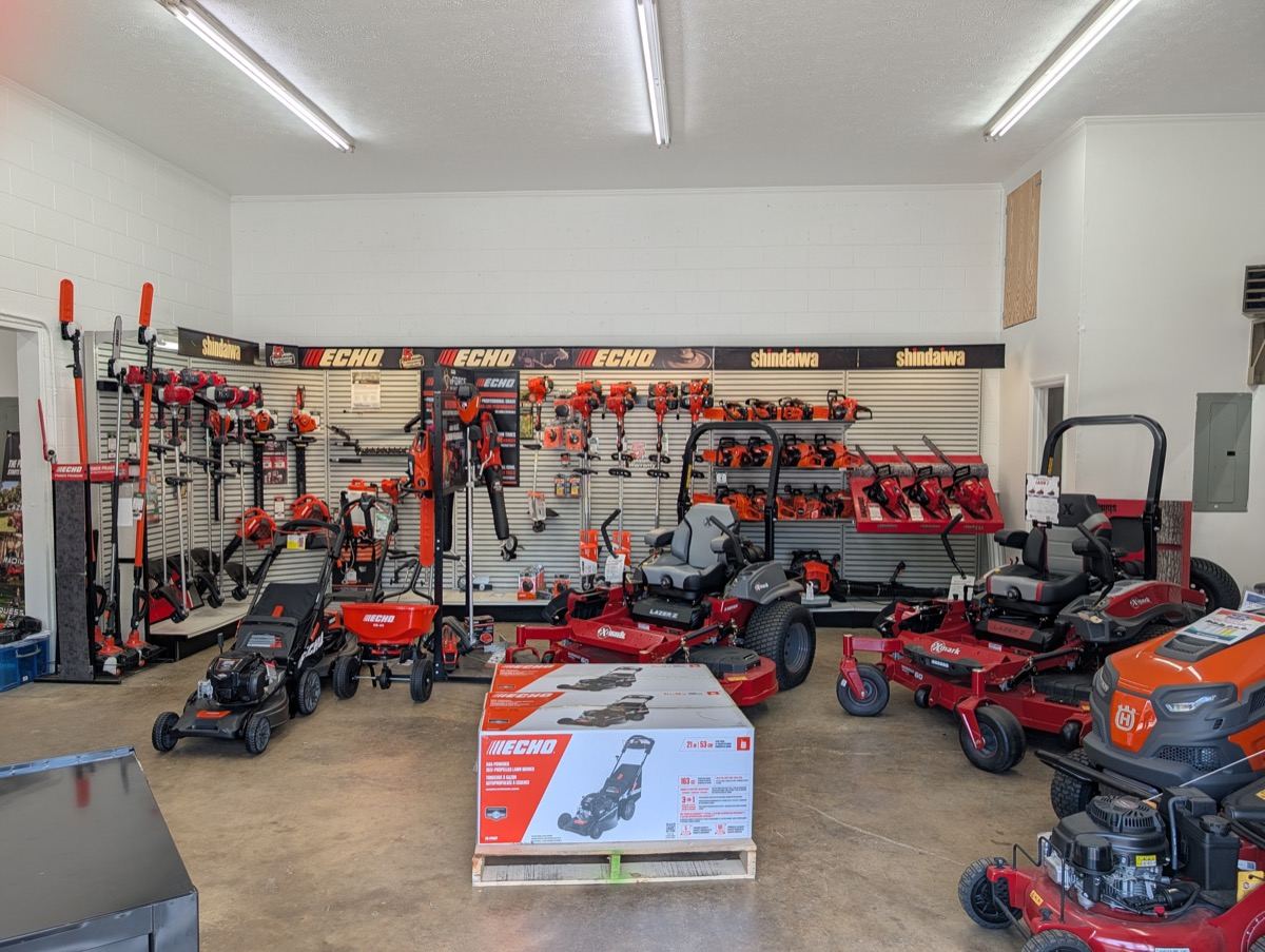 Shindaiwa, Echo, and Exmark equipment on the showroom floor